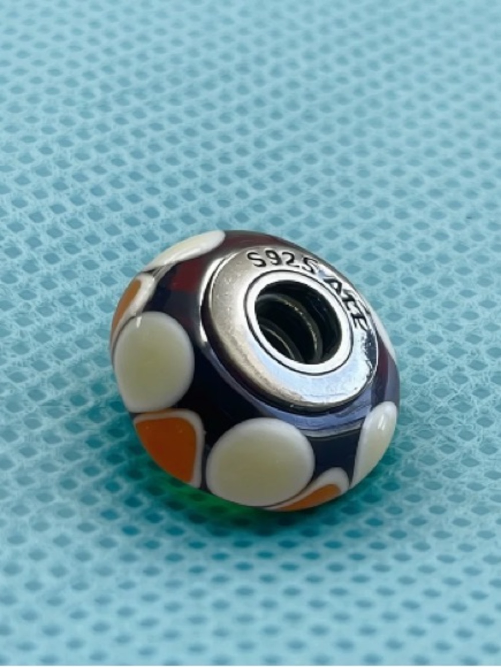 Pandora Black Glass Charm with White and Orange Dots